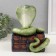 New Year's figure "Cobra on the chest" 20 x 17 x 12 cm, light green