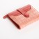 Women's wallet on the button, pink color