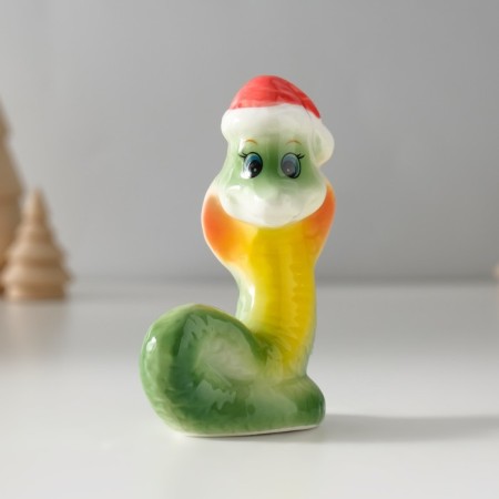 Souvenir Ceramics "Green Cobra in the New Year's cap" 4x6x8 cm