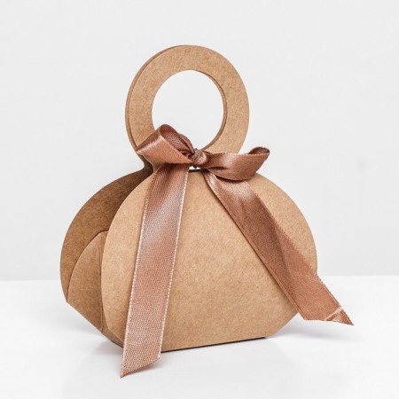 Folding box, with a bow and a pen, craft, 6 x 8 x 3 cm