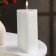 Decorative candle "Triangle with faces", 6x12 cm, white, 12 hours