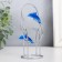 Dolphins pendulum one after another with a ring and a ball 13 x 7 x 5.5 cm