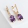 Earrings with rhinestones "blitz", white-purple color in gold