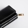 Women's wallet on the button, black color