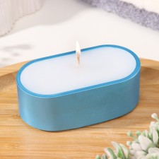 A candle in an oval candlestick of gypsum, 9.5x4.7x3cm, blue