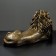 Figure "Leo on vacation" Left, gold, 70x35x25cm