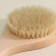 Massage brush for the body of the share, with a pen, natural bristles