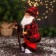 Santa Claus "in a striped sweater and with a staff" 27 cm, moves, red-brown