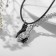 Kulons "Uzolnutinok" on the magnet, handshake, black-silver color, 52 cm