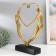 Polystone souvenir "Lovers in the plexus of the heart" gold 37x25x7 cm