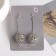 Earrings hanging "ball" interweaving, color silver, 6.5 cm