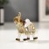 Polystone souvenir "White elephant with a blade of Arab carpet" 6.5x5.7x2.8 cm