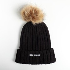 A cap with a pompom 