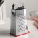 A heap with a doser lid and a side for cheese, a metal pen, color mix