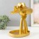 Souvenir Polystone stand "Girl in a hat with a bow" gold 28x21x19 cm