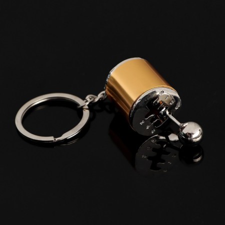 Cartage keychain, gearbox lever, golden