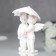 Polystone souvenir "Angels under an umbrella in pink wreaths" 8.5x6.7x6.5 cm