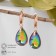 Earrings with “Illusion” rhinestones, a drop is large, the color is white-bonzine in gold