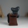Piglite Polystone "The Snake Dark Snow at the safe" 8.3x5.3x11.2 cm