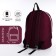 A backpack with a zipper, an outer pocket, burgundy color