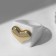 The ring "Heart" is wide, the color is white, size is 18.5