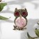 Brooch "owl" ball, pink color in black gold