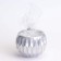 Candle "Shar" in a candlestick with sharp faces of gypsum, 7x6cm, silver