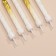 Candles for the cake "Spiral", 6 pcs, white and gradient gold with white