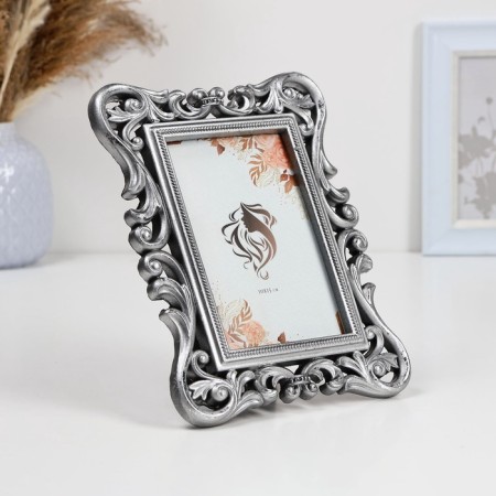 Photo frame "curls" 10x15cm/22.5x17cm, steel with postponement