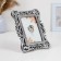 Photo frame "curls" 10x15cm/22.5x17cm, steel with postponement