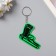 Keychain plastic reflective "gun" 4x6 cm