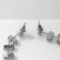 Hanging earrings with rhinestones "bun" rhombus duet, white color in silver, 7 cm