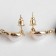 Earrings with pearls "sia" crumpled rings, black and white color in gold