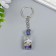 Plastic keychain "Shell and pearl in the bottle" Blue 3.6x1.6x1.6 cm