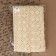 Knitted lace, 70 mm × 15 ± 1 m, beige color