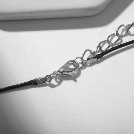 Piece on the Black Night cord in framing, white color in silver on a black lace, 35 cm-2