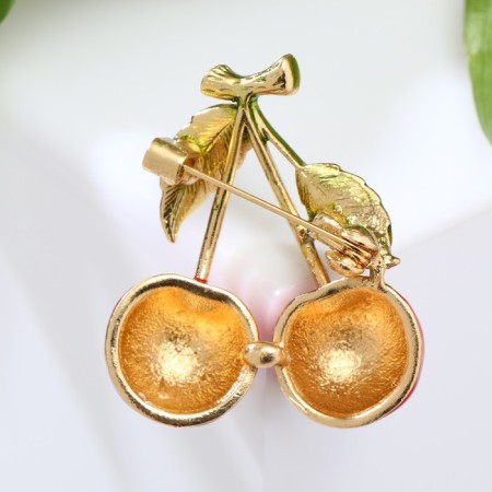Brooch "Cherry" with two leaves on a branch, the color is red-green in gold-1