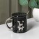 Ceramic mug with a spoon "Stylish Bear", 320 ml, black color