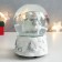 Souvenir Polystone Water Ball Music "Snowmen with skates" White from silver. 11.5x11.5x14 cm