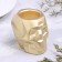 Skull Close from gypsum with faces, 6x9x6.5cm, gold