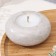 Candle "Complete. Marble" in the candlestick of gypsum large, 11x5 cm, marble with black stripes