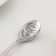 A teaspoon spoon with an engraving “The most charming and attractive”, h = 14cm.