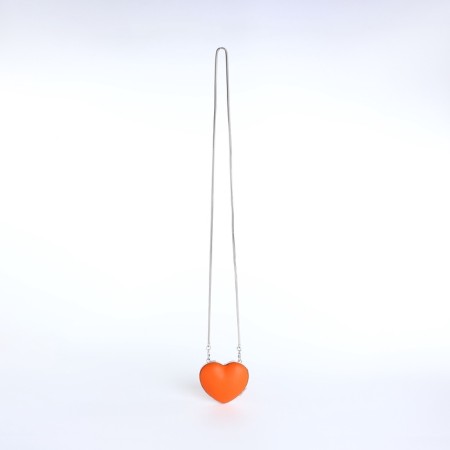 Female bag on a magnet, orange color