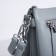 Cross-Bodi Bag on a zipper, 3 external pockets, the color of a gray-blue