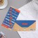 The envelope for the money is "the best person!" glitter, congruen, text, blue background, 16.8x8.3 cm