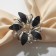 Ring for the scarf "flower", circle, black color in silver