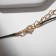 Piece on the Black Night cord in a frame, white in gold in a black lace, 35 cm