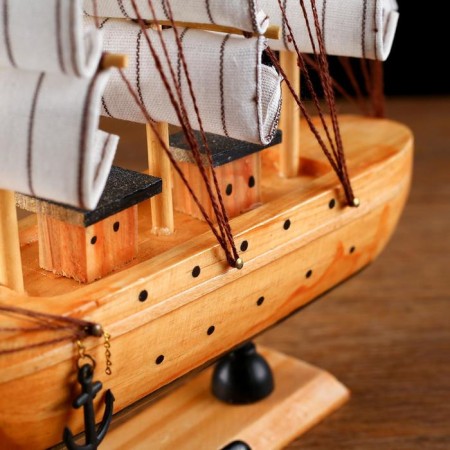 The ship souvenir medium "Ginder", board is light wood, white sails, 30x7x30 cm-4