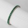 Bracelet with rhinestones "shine" on a puff, emerald color in gold