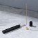 Penal for storing incense, black, metal, with incense